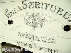 a sign that says wine and spiritueu speciale de vins fines