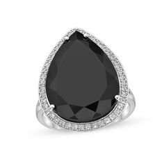 Exude a confident vibe when you wear this distinct and bold rich black onyx and white topaz ring. Crafted in sleek sterling silver This choice features an eye-catching 20.0 x 15.0mm pear-shaped black onyx. A frame of white topaz surrounds the center in shimmer. Split-shank style Available in select sizes only Pear Halo, Pear Shaped Ring, Big Jewelry, Split Shank Ring, Emerald Cut Rings, Black Onyx Ring, Onyx Ring, Topaz Ring, White Topaz