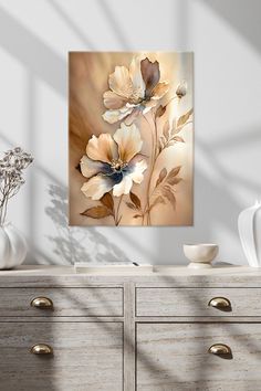 an abstract floral painting on a wall above a dresser