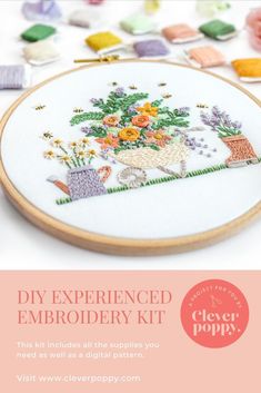 an embroidery kit with flowers and potted plants