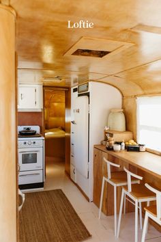 a kitchen and dining area in an rv