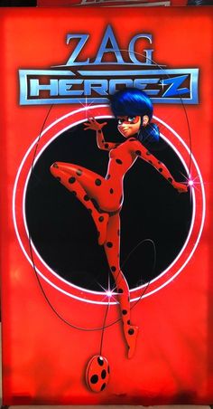 an advertisement for the animated movie zag heroz, featuring a woman in red and black polka dots