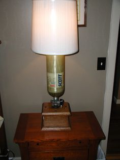 a lamp on top of a wooden table