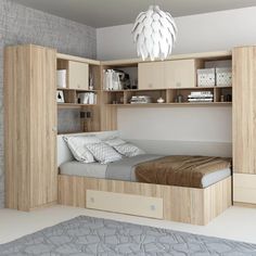 a bed room with a neatly made bed and shelves