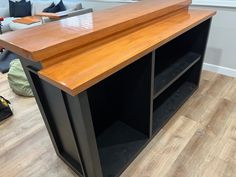 a wooden counter top sitting on top of a hard wood floor