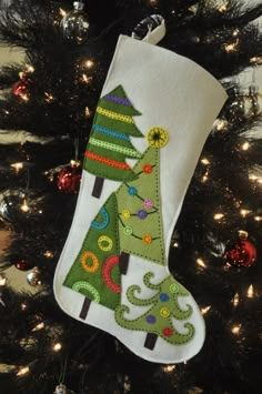 a christmas stocking hanging from a tree