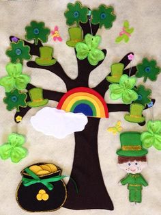 an image of st patrick's day tree with leprechauns and pot of gold