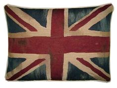 an old british flag pillow on a white background