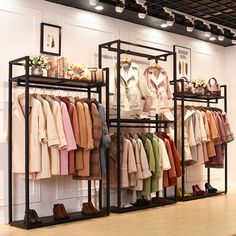 the clothing rack is filled with clothes and shoes