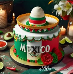 a mexican themed cake with candles and flowers