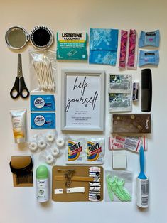 the contents of a crafting kit laid out on a white surface with scissors, glue, toothpaste and other items