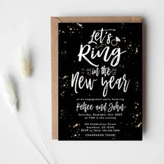 a black and gold new year's card with the words let's ring on it