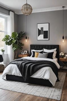 a bedroom with grey walls, white bedding and wooden floors is pictured in this image