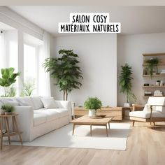 a living room filled with white furniture and potted plants