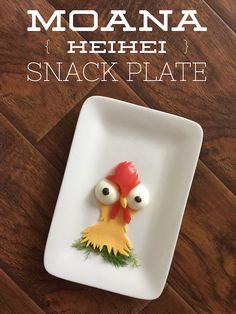 there is a small plate with a chicken on it and the words moana herei snack plate