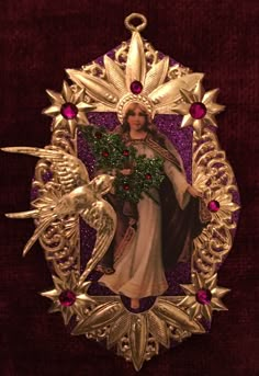 an image of the immaculate mary with doves and holly wreath on a red velvet background