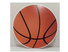 an orange basketball on a white surface with black lines painted on it's side