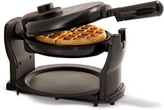 a waffle maker with a pancake on it