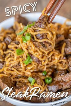 beef and noodles in a bowl with chopsticks sticking out of the meat to eat