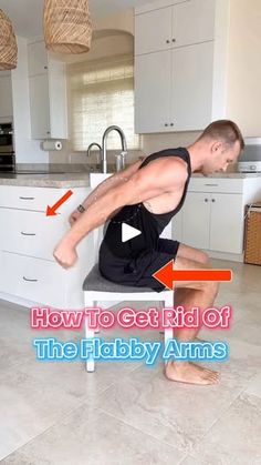 a man sitting on top of a stool in a kitchen next to a counter with the words how to get rid of the baby arms