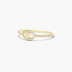 The evil eye symbol is believed to protect those who wear them. Crafted in yellow gold and diamonds, this evil eye ring is the perfect amulet to stay protected and fashionable. Evil Eye Symbol, The Evil Eye, Eye Symbol, Evil Eye Ring, Eye Ring, Evil Eye, Diamond Rings, Fashion Rings, Diamond Ring