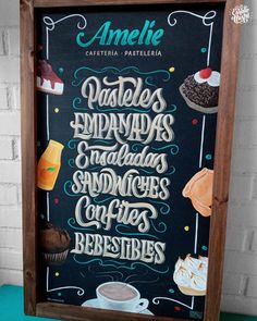 a chalkboard sign with coffee and pastries written in spanish on the side of a brick wall