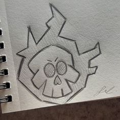 a drawing of a skull with an arrow in the middle