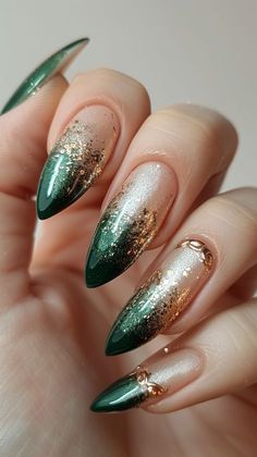 Green And Bronze Nails, Black Green Gold Nails, Christmas Dark Nails, Almond Nails With Gold Flakes, Slytherin Nail Ideas, Green Nail Trends, Green Emerald Nails, Gold Green Nails, Forest Green Nail Designs