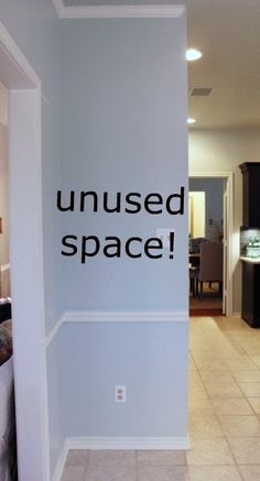 an uninsed space sign is posted on the wall in a kitchen area with tile flooring