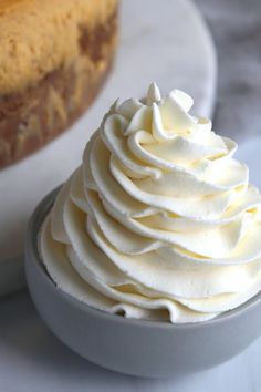 a close up of a cake in a bowl on a table