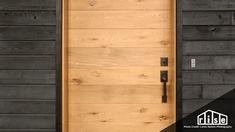 a close up of a wooden door on a building