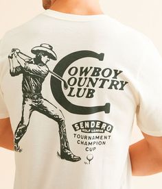 Sendero Provisions Co. Cowboy Country Club T-Shirt - Cream Medium, Men's White Graphic t-shirt. 60% Cotton 40% Polyester. Machine wash warm. Tumble dry low. Do not bleach. Do not iron. Apparel & Accessories > Clothing > Shirts & Tops Men’s Western T Shirts, Vintage Golf Apparel, Men's Graphic Tee, Cotton Golf Shirt With Graphic Print, Golf T-shirt With Graphic Print And Short Sleeves, Graphic Tee Crew Neck T-shirt For Golf, Golf Graphic Print Crew Neck T-shirt, Crew Neck T-shirt With Graphic Print For Golf, Graphic Print Crew Neck T-shirt For Golf