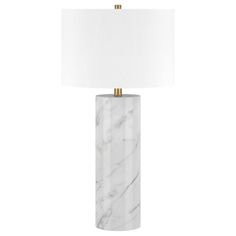 a white marble lamp with a gold metal base and a white shade on the top