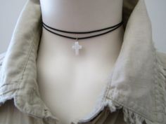 "This mini cross choker necklace features a natural white shell cross pendant hanging from sturdy polyester cord in black. The necklace finished off a stainless steel lobster clasp and comes with an additional 2\" extender chain. Simple and versatile. Great addition to your daily attire! White Shell Cross measures approx.0.39\"x0.55\"(10x14mm) ♥︎ Select your preferred necklace length at checkout. *Extender chain does not include in length. ♥ You will receive this necklace gift wrapped with an organza pouch. Please feel free to ask me if you have any questions. :) Check out my other items.   http://jaspersdream.etsy.com/" Cross Necklace Black, Shell Cross, Cross Choker Necklace, Lace Camisole Top, Cord Choker, Wire Crochet Jewelry, Cross Choker, Organza Pouch, Mini Cross