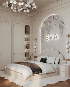 a bedroom with white furniture and chandelier above the bed is decorated in an art deco style