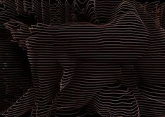 an abstract background consisting of wavy lines and curves in brown, black and white colors