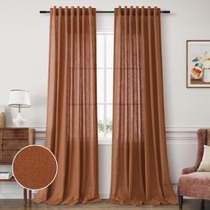 a living room with a chair, window and curtains in brown color on the wall