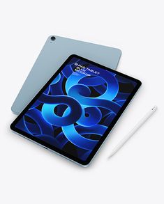 an ipad and pen sitting on top of a white surface next to each other,