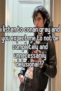 a man standing in front of a door with the caption, i listen to coan gray and you expect me to not be completely and uneces