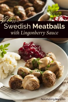 swedish meatballs with lingonberry sauce on a plate next to mashed potatoes