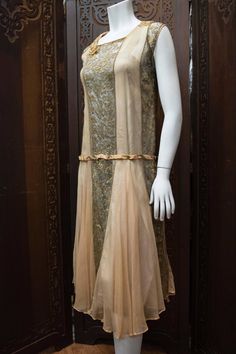 1920s Lace and Silk Georgette Dress. The dress made from gold lamé lace threads featuring a peach silk georgette inserts, matching peach silk slip, and drop waist peach velvet belt. Front Silk Georgette Dress, Velvet Belt, Georgette Dress