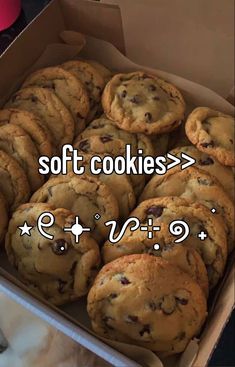 a box filled with lots of chocolate chip cookies