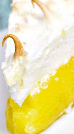 a slice of lemon cake on a white plate