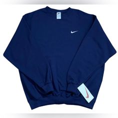 New With Tags, Sealed In Original Plastic -Length 31 Inches; Pit To Pit 27 Inches; Sleeve 24 Inches (Xl) Vintage Nike Swoosh Navy / White Crewneck Sweatshirt. If You Miss The Quality Of The 90s, Here Is Your Chance To Get This Never Tried Or Worn Before Navy Crewneck. The Swoosh Is Embroidered In White On The Heavy Duty Sweatshirt. Navy Crew Neck Sweatshirt In Athleisure Style, Nike Sporty Crew Top, Nike Crew Neck Athleisure Top, Nike Sportswear Crew Top, Nike Cotton Sports Sweater, Nike Cotton Sweater For Sports, Nike Navy Sporty Sweatshirt, Blue Crew Neck Athleisure Sweater, Nike Blue Tops For Fall