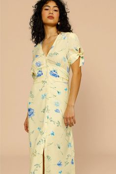 Elevate your wardrobe with the elegant floral midi dress, inspired by French style. Perfect for any casual occasion, this dress exudes sophistication and charm. Its versatile design makes it a must-have for any fashion forward individual. Elegant V-neck Midi Dress With Ditsy Floral Print, Chic Ditsy Floral Maxi Dress For Day Out, Elegant Floral Maxi Dress For Daywear, Elegant Floral Midi Dress For Summer, Elegant Summer Floral Midi Dress, Feminine Knee-length Mini Dress With Ditsy Floral Print, Feminine Knee-length Ditsy Floral Mini Dress, Chic Floral Print Maxi Dress For Daywear, Feminine Midi-length Viscose Dress