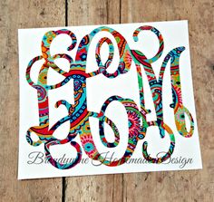 the word hope is made up of colorful paisley designs on a white paper with wood background