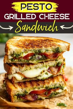 grilled cheese sandwich stacked on top of each other with the words pesto grilled cheese sandwich