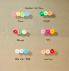 there are many different colored buttons on the wall together, and each has their own name