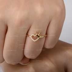 Description Solid 14K Yellow Gold Heart Crown Ring With Genuine 0.08 Ct. SI Clarity G H Color Diamond Love Heart Ring Minimalist Jewelry Gift For Her ≫ Features * Items Code:- SR01710 * Solid 14K Yellow Gold with stamped * 18K also available - Additional fees may apply) * More option in gold color:- Rose gold, yellow gold, White gold * Diamonds Wt.:- 0.08 Ct. * Diamond color:- G-H * Diamonds Clarity:- SI * Diamonds Cut:- Brilliant * Ring Size:- 3 to 10 (As per your request) ≫ FAQ below for more Gold Jewelry Fashion Ring, Pretty Jewellery Rings, Ladies Rings Gold Design, Crown Ring Design, Gold Ring Ideas, New Ring Designs Gold, Rose Gold Crown Ring, Love Ring Gold