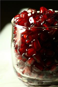 a glass jar filled with lots of red candy